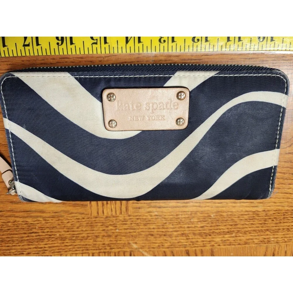 KATE SPADE BLACK WITH WHITE WAVES ZIP AROUND WALLET